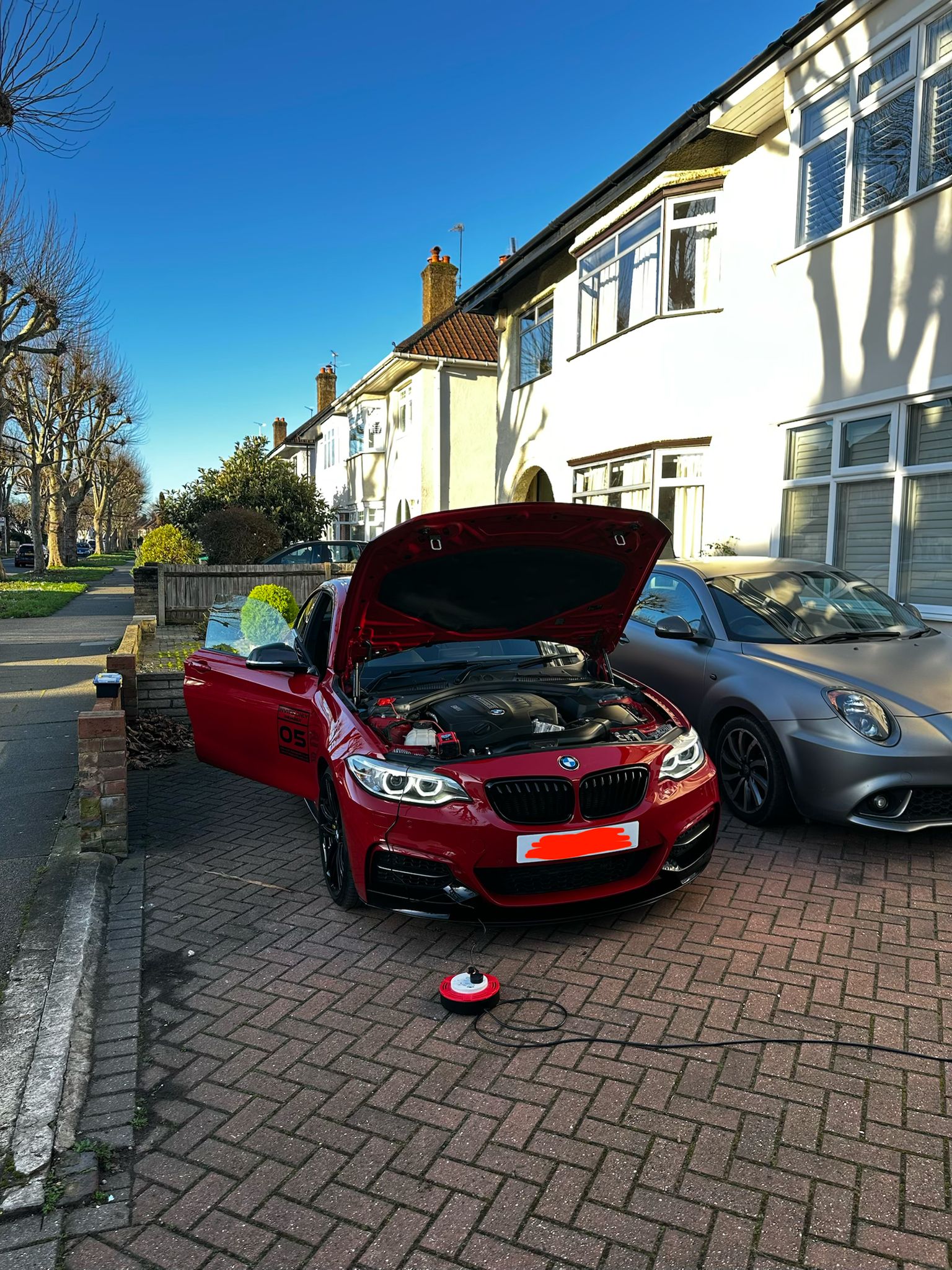 Red M235i mobile coding